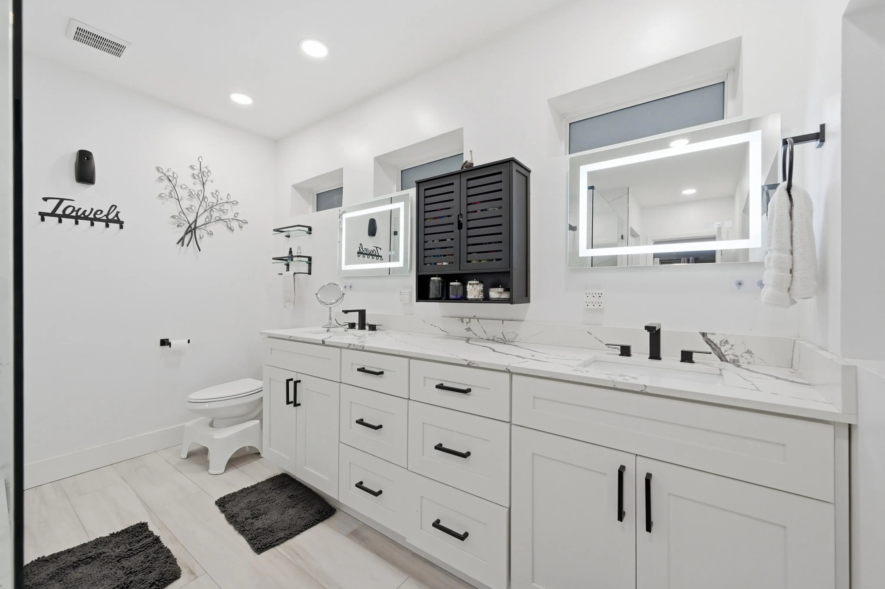 Beautifully renovated oversized primary bathroom designed with comfort, style, and everyday luxury in mind.