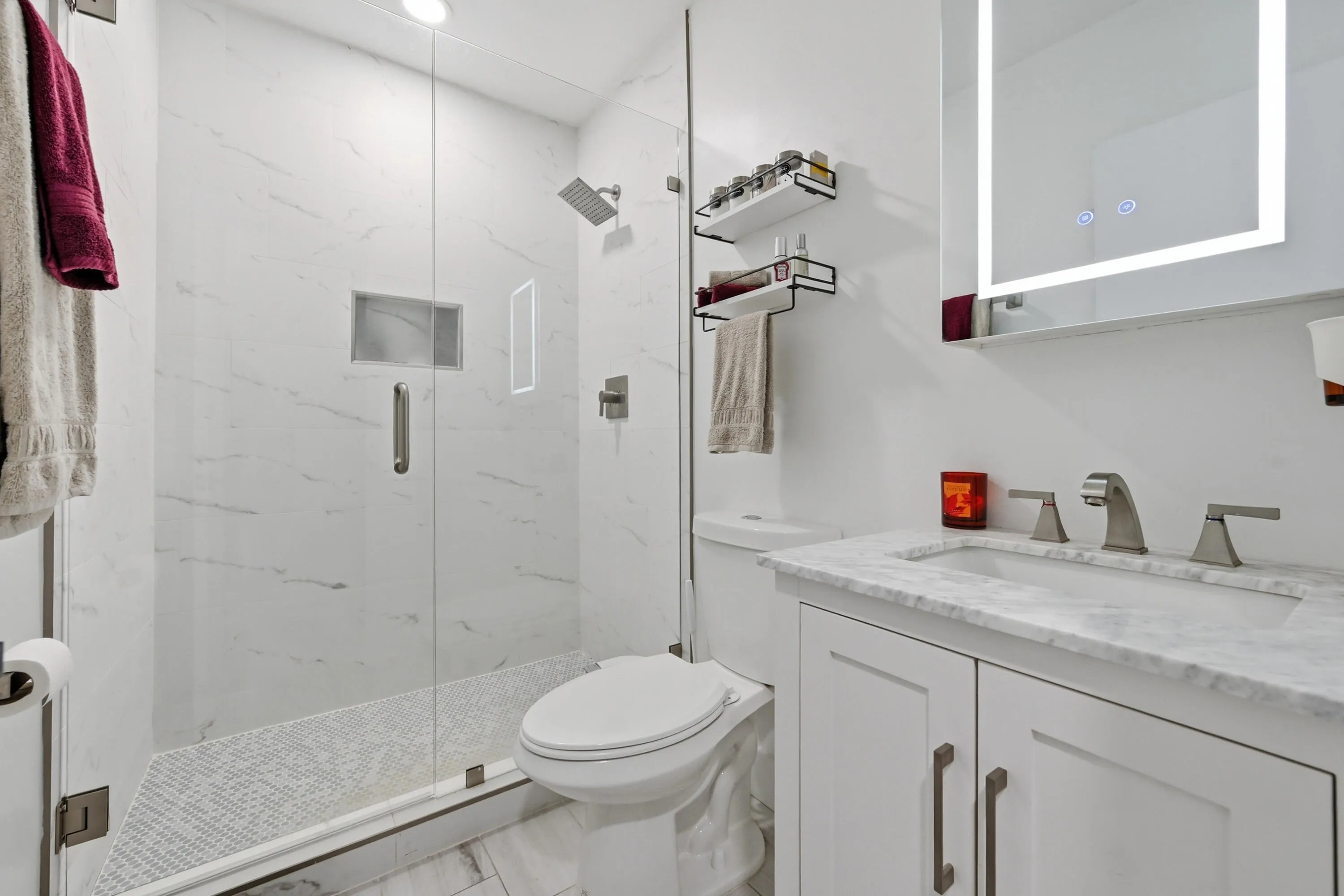Beautifully renovated full bathroom thoughtfully designed with modern finishes and everyday convenience.