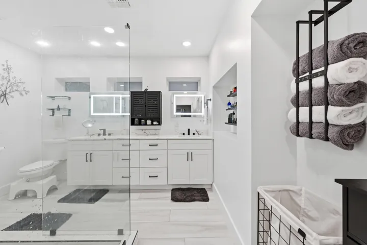 Thoughtfully renovated oversized primary bathroom offering a spa inspired retreat within your own home.