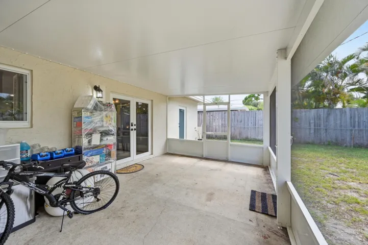Expansive screened patio creates the perfect year round space for relaxing, entertaining, and enjoying the South Florida lifestyle.