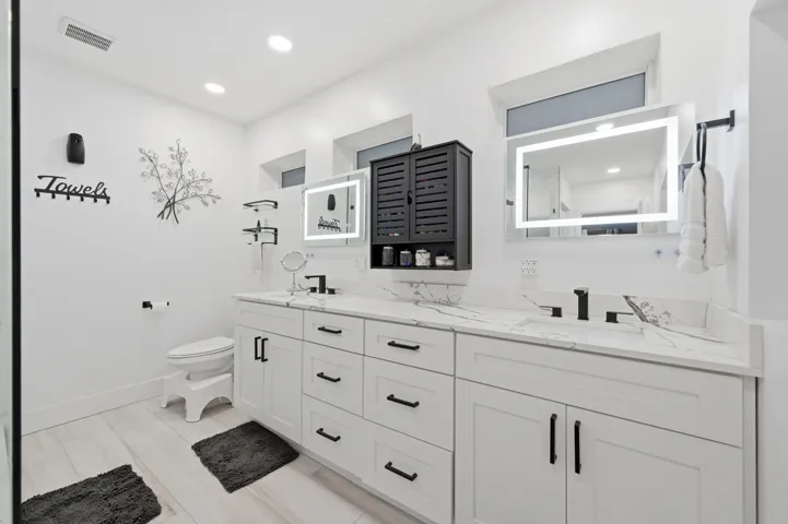 Beautifully renovated oversized primary bathroom designed with comfort, style, and everyday luxury in mind.