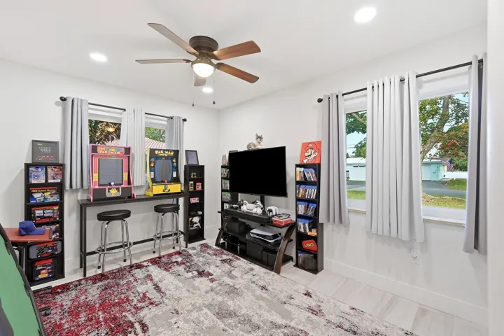 Spacious guest bedroom offering comfort, versatility, and plenty of room to fit your lifestyle.