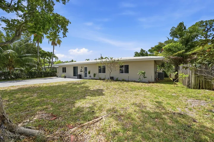 Beautifully updated home with inviting curb appeal in sought after Pompano Beach.