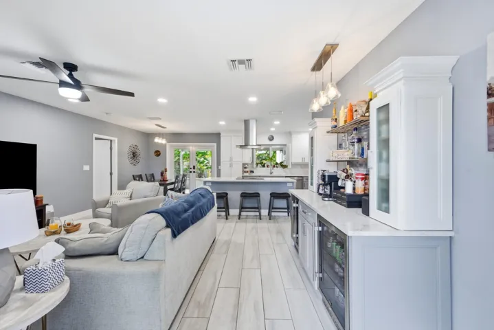 From the moment you enter, the open concept design showcases the seamless flow that makes this home so inviting.