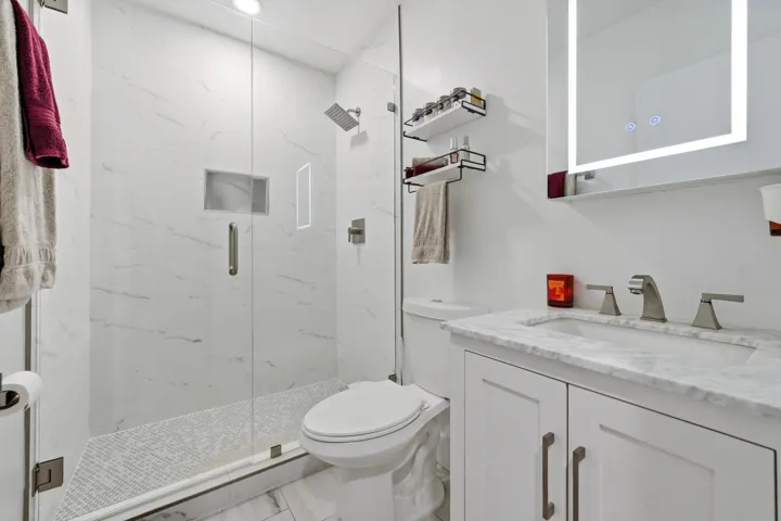 Beautifully renovated full bathroom thoughtfully designed with modern finishes and everyday convenience.