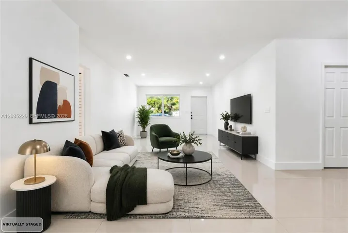 Virtually staged living room showcasing the bright, open layout.