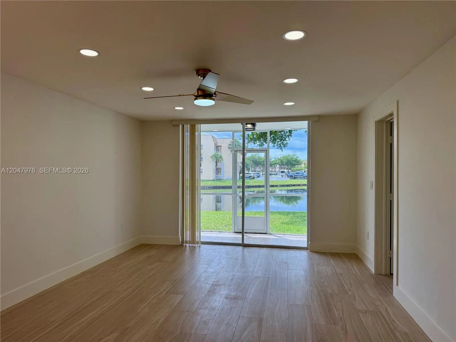 Tranquil view and new modern flooring, lighting fixtures and recessed lighting