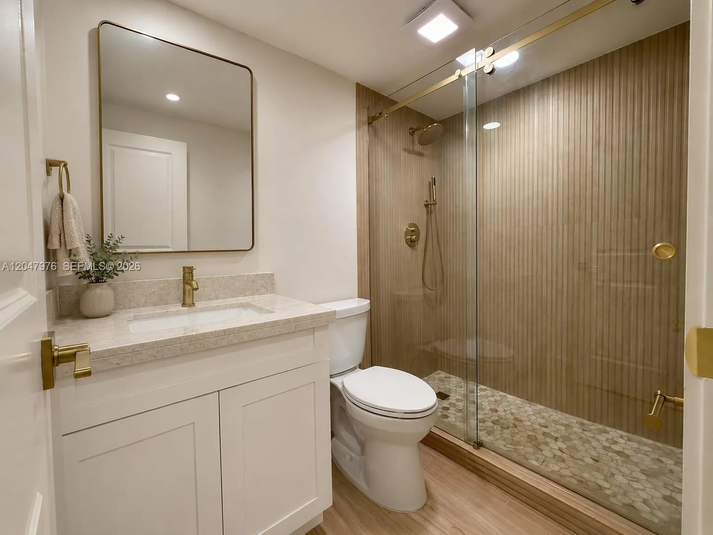 Virtual rendering, new quartzite counters and mirror are being installed. Everything brand new, never been used. This image is a virtual rendering for illustrative purposes only. Actual property conditions, features, and finishes may vary.