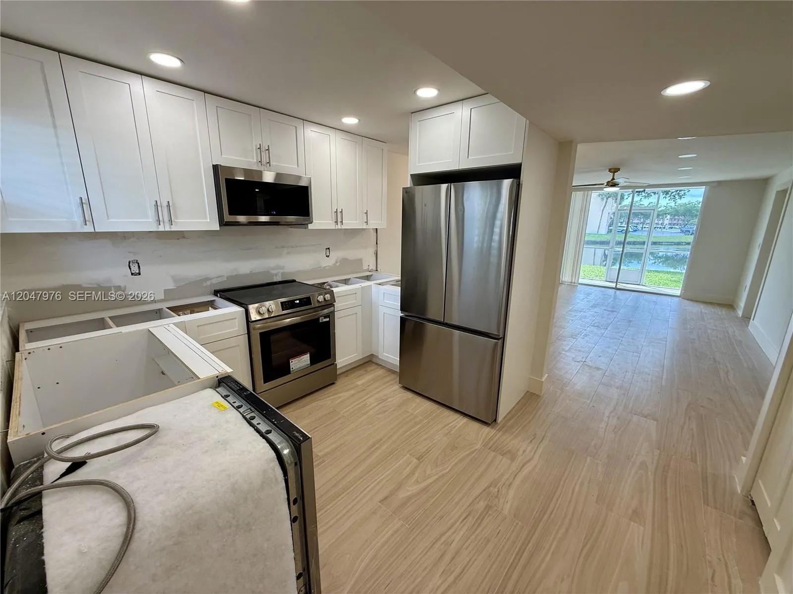 * NEW NEW NEW* Everything brand new, never been used* Brand new stainless steel appliances with a farmhouse stainless steel sink and quartzite countertops