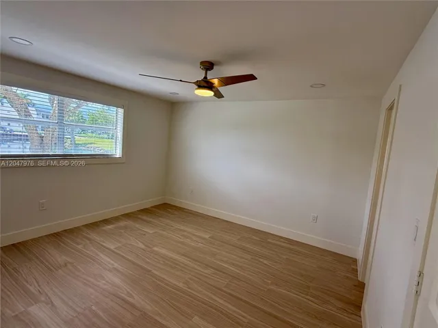 Tranquil view and new modern flooring, lighting fixtures and recessed lighting