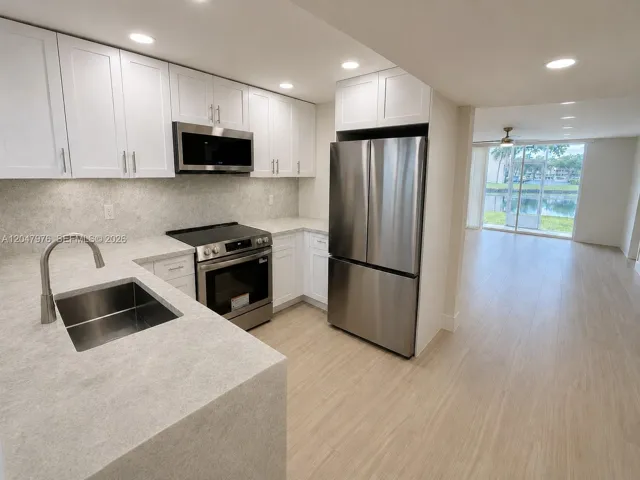 Virtual rendering, new quartzite counters being installed. This image is a virtual rendering for illustrative purposes only. Actual property conditions, features, and finishes may vary.