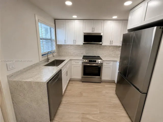 Virtual rendering, new quartzite counters being installed. This image is a virtual rendering for illustrative purposes only. Actual property conditions, features, and finishes may vary.