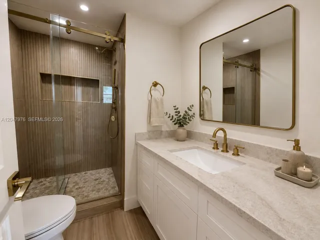 Virtual rendering, new quartzite counters and mirror are being installed.
