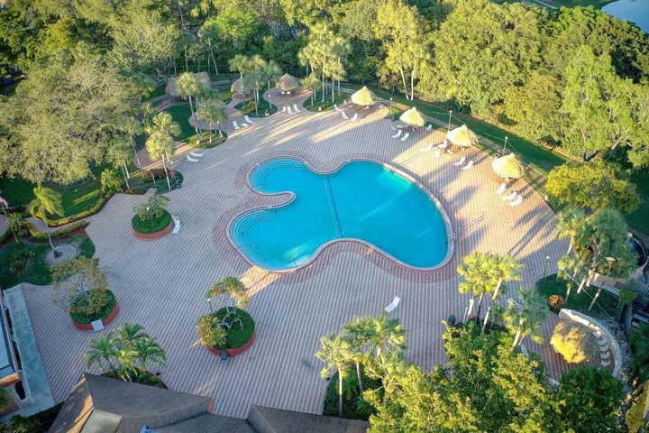 3071 main clubhouse pool, trees