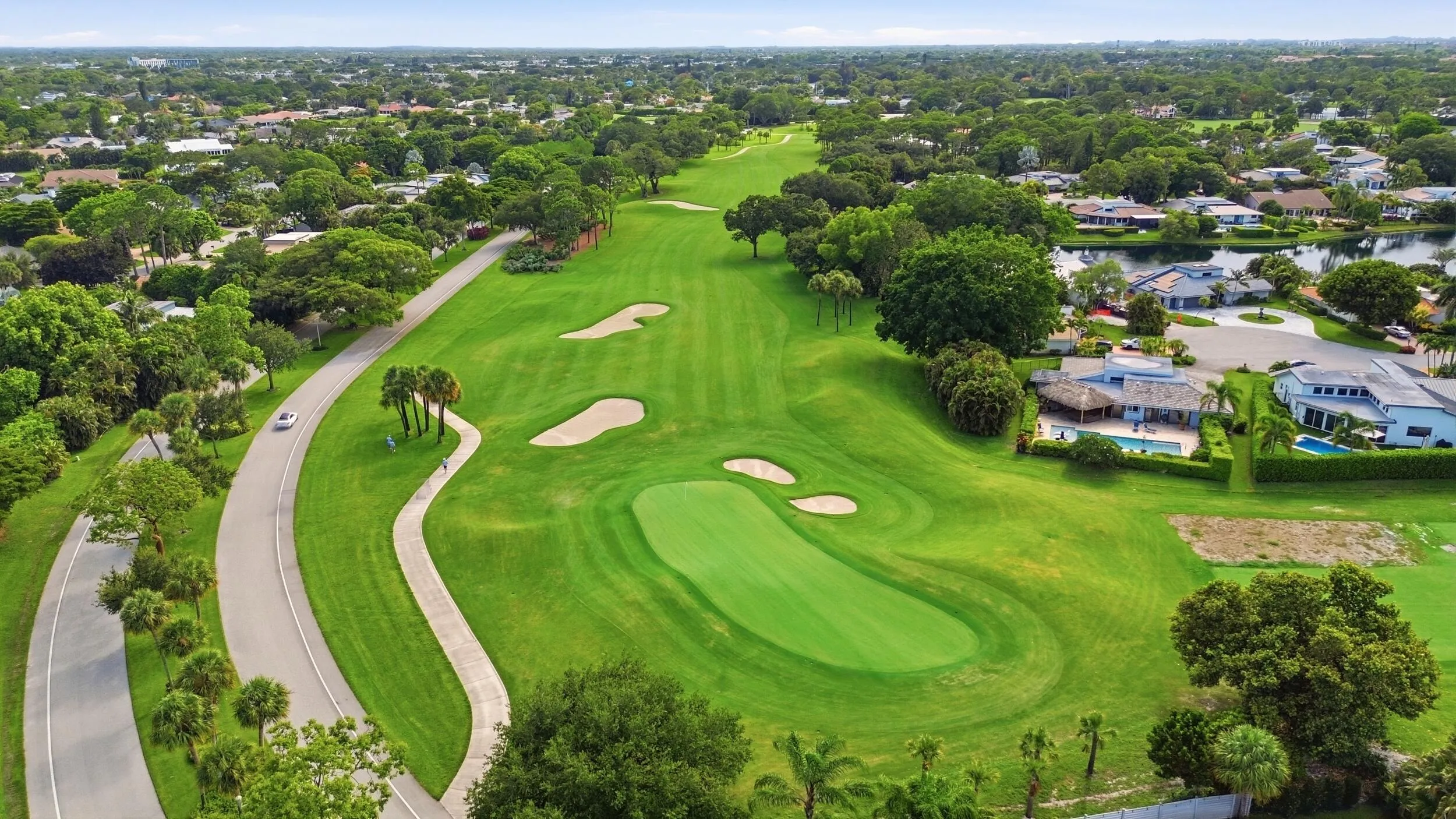 The beautifully reimagined Seagate Golf Club offers an exceptional golfing experience set across 300 acres of meticulously maintained landscape. Originally designed by renowned architect Joe Lee and recently transformed through an extensive renovation, the championship course features picturesque tree lined fairways, strategically redesigned bunkers, and expansive new greens that have elevated it into one of Florida's premier private golf destinations. Whether you're an avid golfer or simply appreciate the beauty of the surroundings, the course provides an unforgettable backdrop to life at Seagate Country Club.