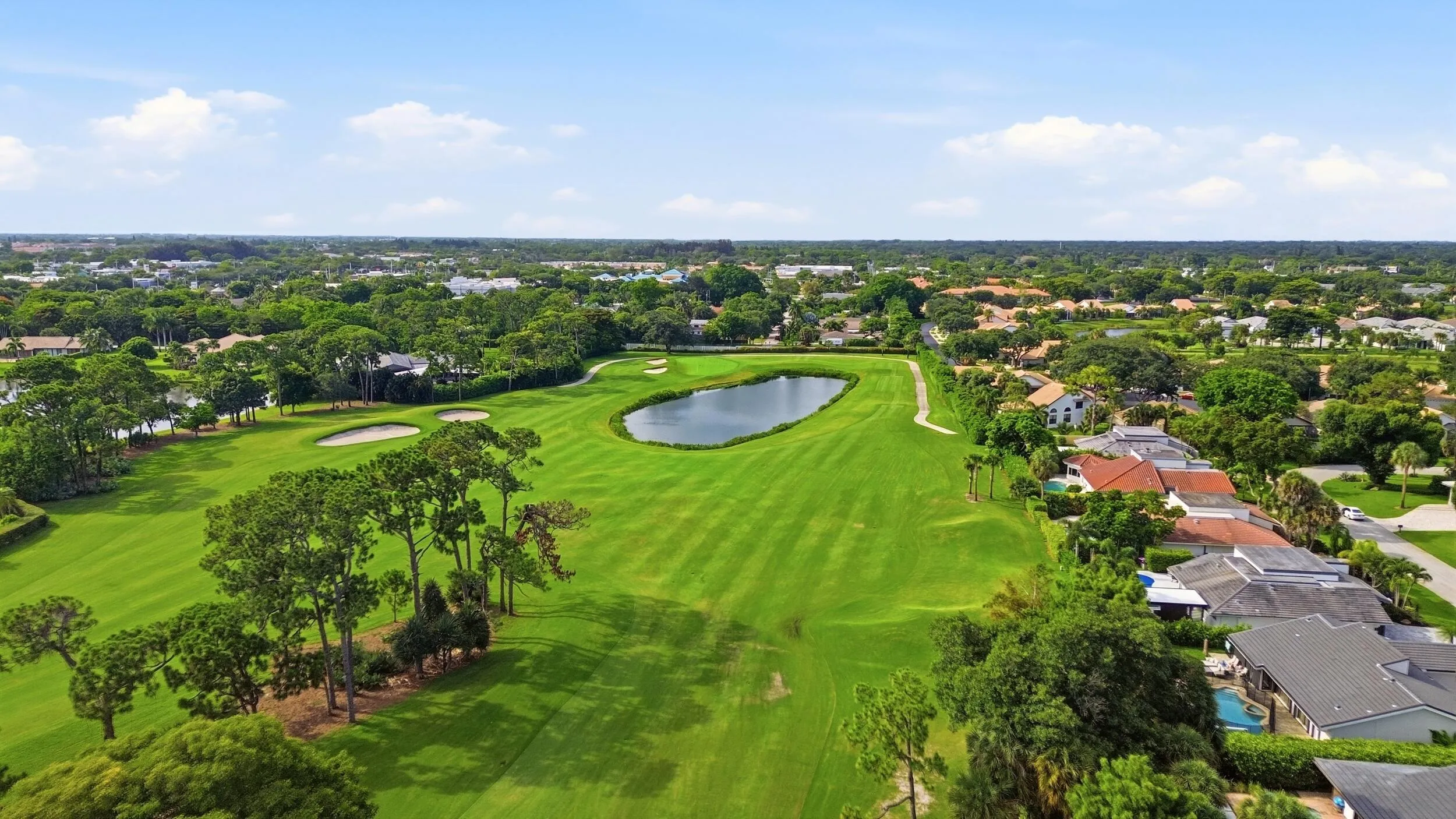 The beautifully reimagined Seagate Golf Club offers an exceptional golfing experience set across 300 acres of meticulously maintained landscape. Originally designed by renowned architect Joe Lee and recently transformed through an extensive renovation, the championship course features picturesque tree lined fairways, strategically redesigned bunkers, and expansive new greens that have elevated it into one of Florida's premier private golf destinations. Whether you're an avid golfer or simply appreciate the beauty of the surroundings, the course provides an unforgettable backdrop to life at Seagate Country Club.