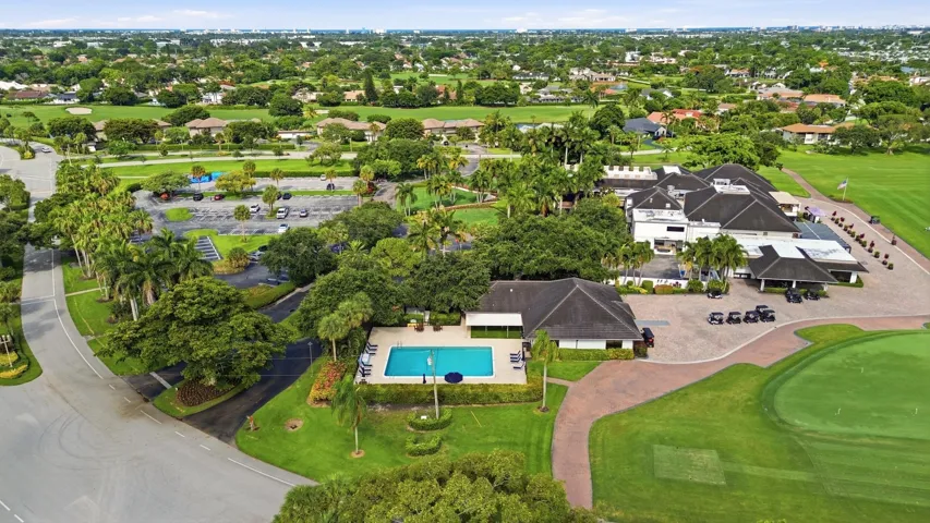 Relax and unwind at the resort style pool, surrounded by lush tropical landscaping and just steps from the Seagate Country Club clubhouse.