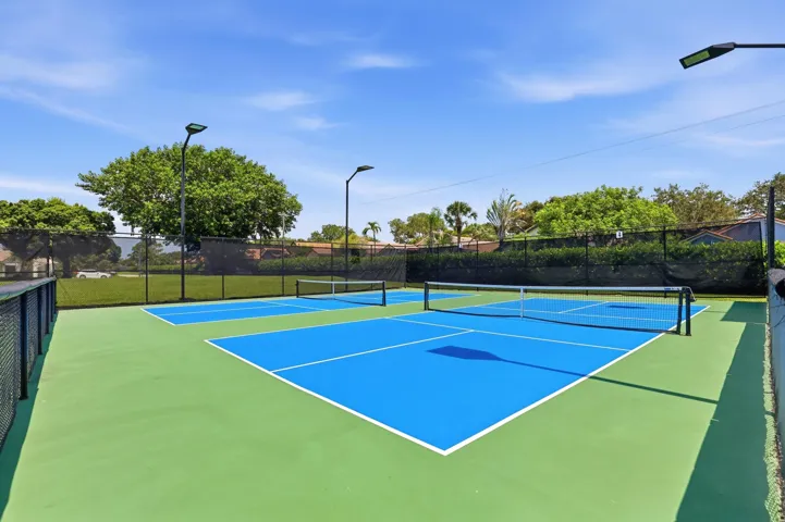 Enjoy one of the community's most popular amenities with beautifully maintained pickleball courts featuring covered seating, providing the perfect place for friendly competition, staying active, and connecting with neighbors year round.