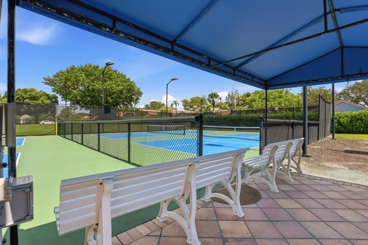 Enjoy one of the community's most popular amenities with beautifully maintained pickleball courts featuring covered seating, providing the perfect place for friendly competition, staying active, and connecting with neighbors year round.