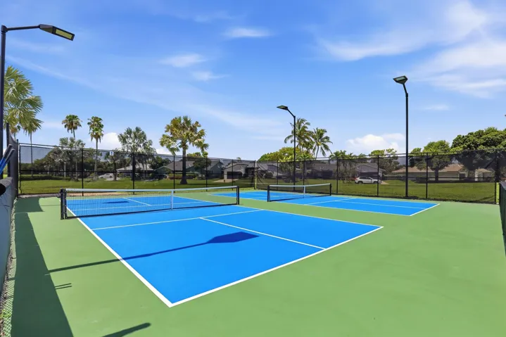 Enjoy one of the community's most popular amenities with beautifully maintained pickleball courts featuring covered seating, providing the perfect place for friendly competition, staying active, and connecting with neighbors year round.