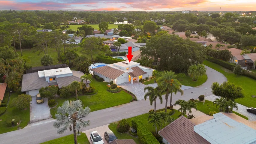 From above, the true rarity of this property comes into focus. Perfectly positioned on an oversized cul de sac lot, the home backs directly to a protected nature preserve, offering an exceptional level of privacy and lush natural surroundings that are seldom found in South Florida. Nestled within the prestigious Seagate Country Club, the only Five Star private club community located just minutes from Downtown Delray Beach, this exceptional residence offers the perfect balance of peaceful seclusion and everyday convenience. Enjoy effortless access to Atlantic Avenue's renowned boutiques, award winning restaurants, pristine beaches, and vibrant coastal lifestyle, all while returning home to the privacy and tranquility of this exclusive setting.