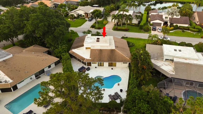 From above, the true rarity of this property comes into focus. Perfectly positioned on an oversized cul de sac lot, the home backs directly to a protected nature preserve, offering an exceptional level of privacy and lush natural surroundings that are seldom found in South Florida. Nestled within the prestigious Seagate Country Club, the only Five Star private club community located just minutes from Downtown Delray Beach, this exceptional residence offers the perfect balance of peaceful seclusion and everyday convenience. Enjoy effortless access to Atlantic Avenue's renowned boutiques, award winning restaurants, pristine beaches, and vibrant coastal lifestyle, all while returning home to the privacy and tranquility of this exclusive setting.