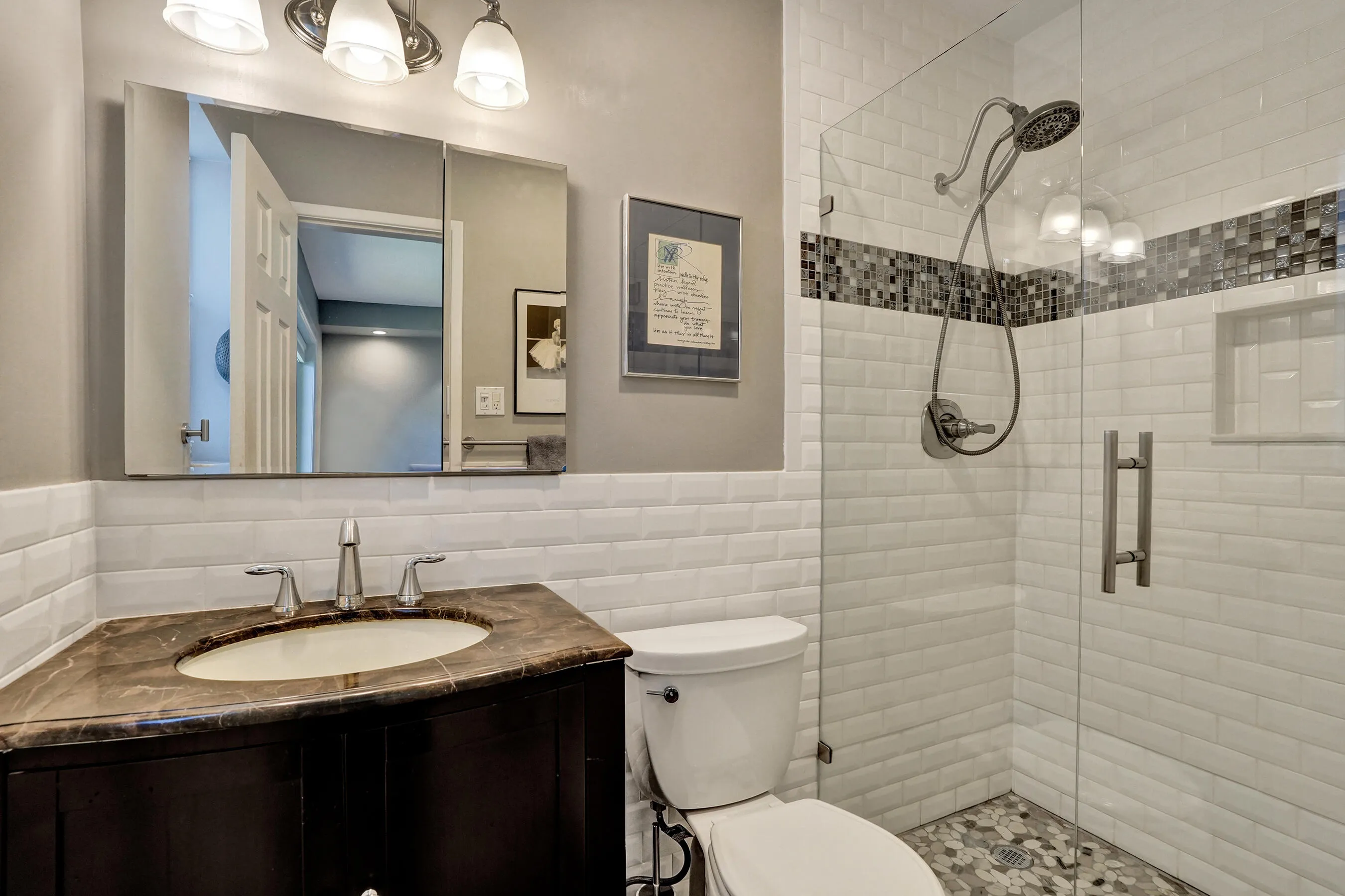 Completely remodeled primary bath with timeless finishes, quality craftsmanship, and move-in-ready design.