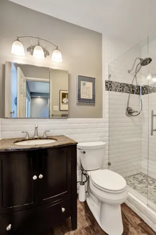 Completely remodeled primary bath with timeless finishes, quality craftsmanship, and move-in-ready design.
