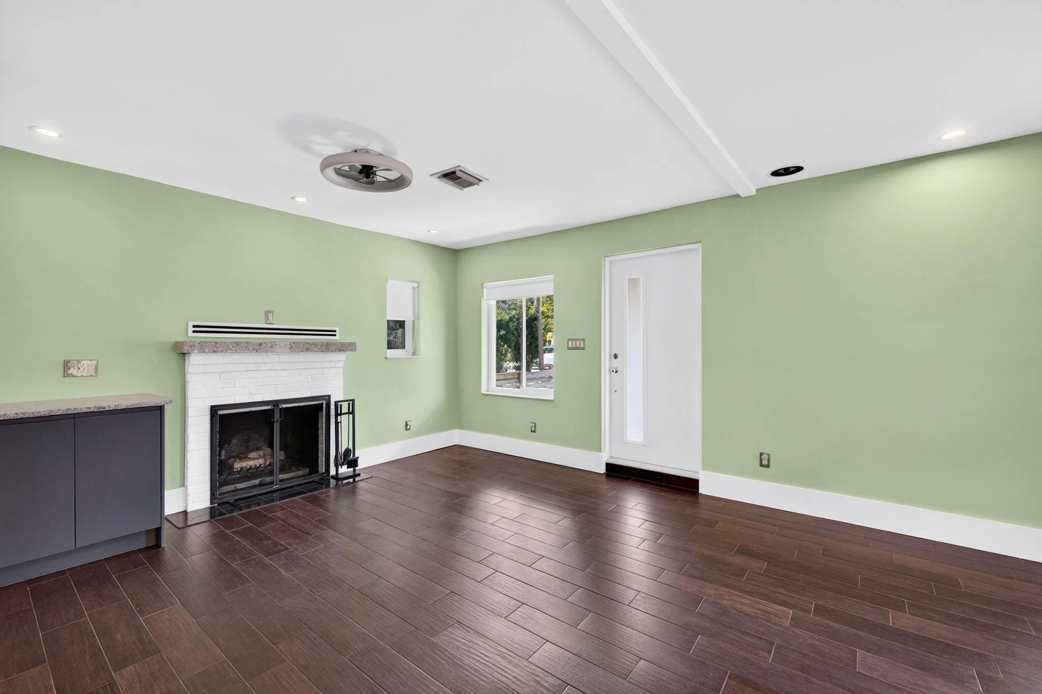 Walk in to dining/living with a fireplace