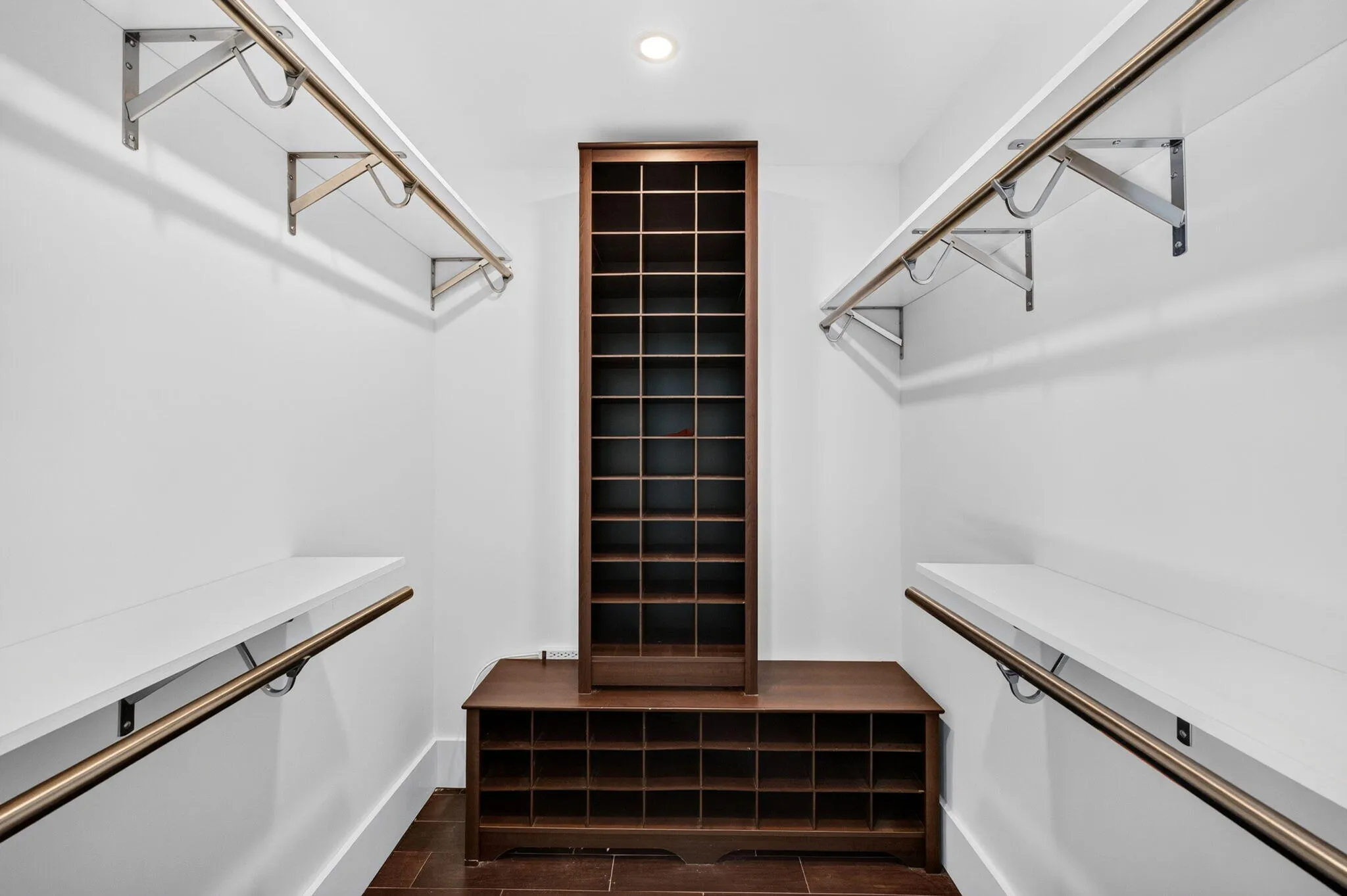 Walkin closet in primary bedroom