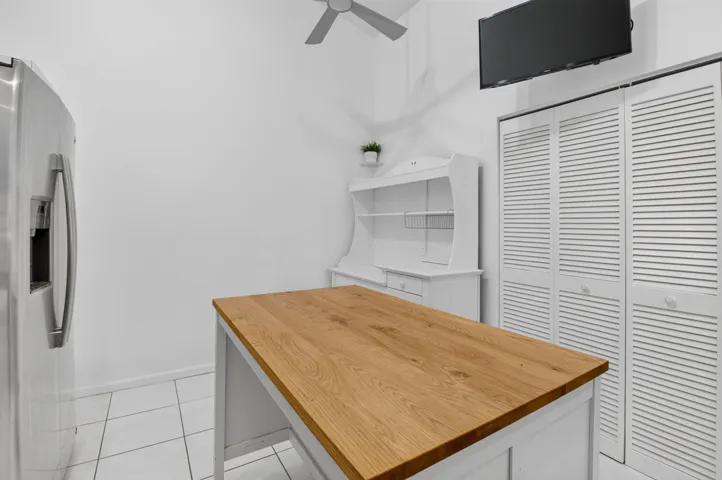Moveable island provides added workspace & flexible dining options.