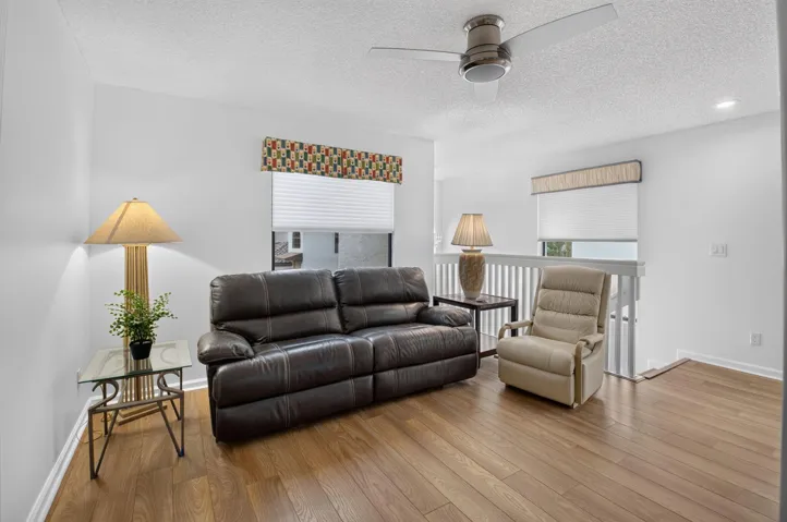 Comfortable flex space filled with natural light and warmth.