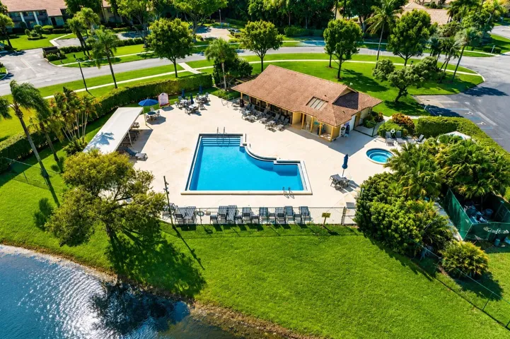 Take advantage of the nearby heated pool, relaxing spa, and spacious sundeck overlooking the community lake.