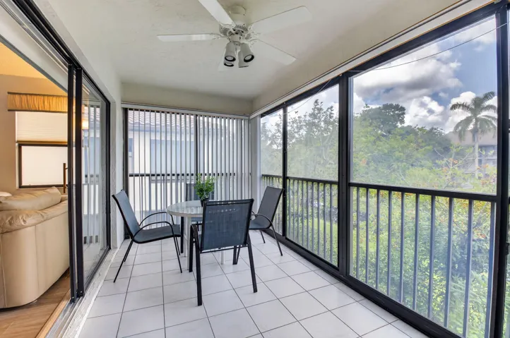 Relax overlooking peaceful water & lush tropical landscaping.