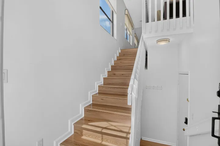 Soaring ceilings and sunlit staircase an impressive first impression.