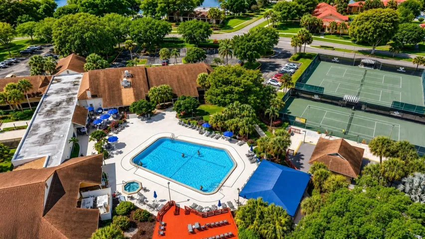 Clubhouse, pool, spa, & tennis courts in one beautiful setting.