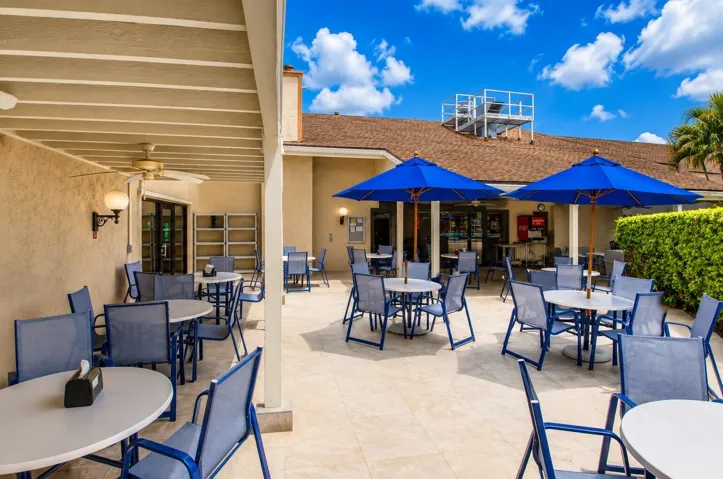 Perfect spot to relax, socialize, or enjoy refrshments poolside.