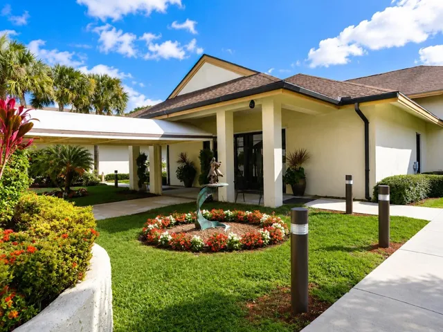 Beautifully landscaped entrance welcomes residents and guests year-round.