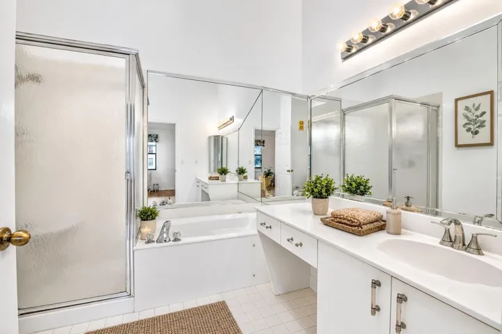Relax with soaking tub, seperate shower, and generous vanity.