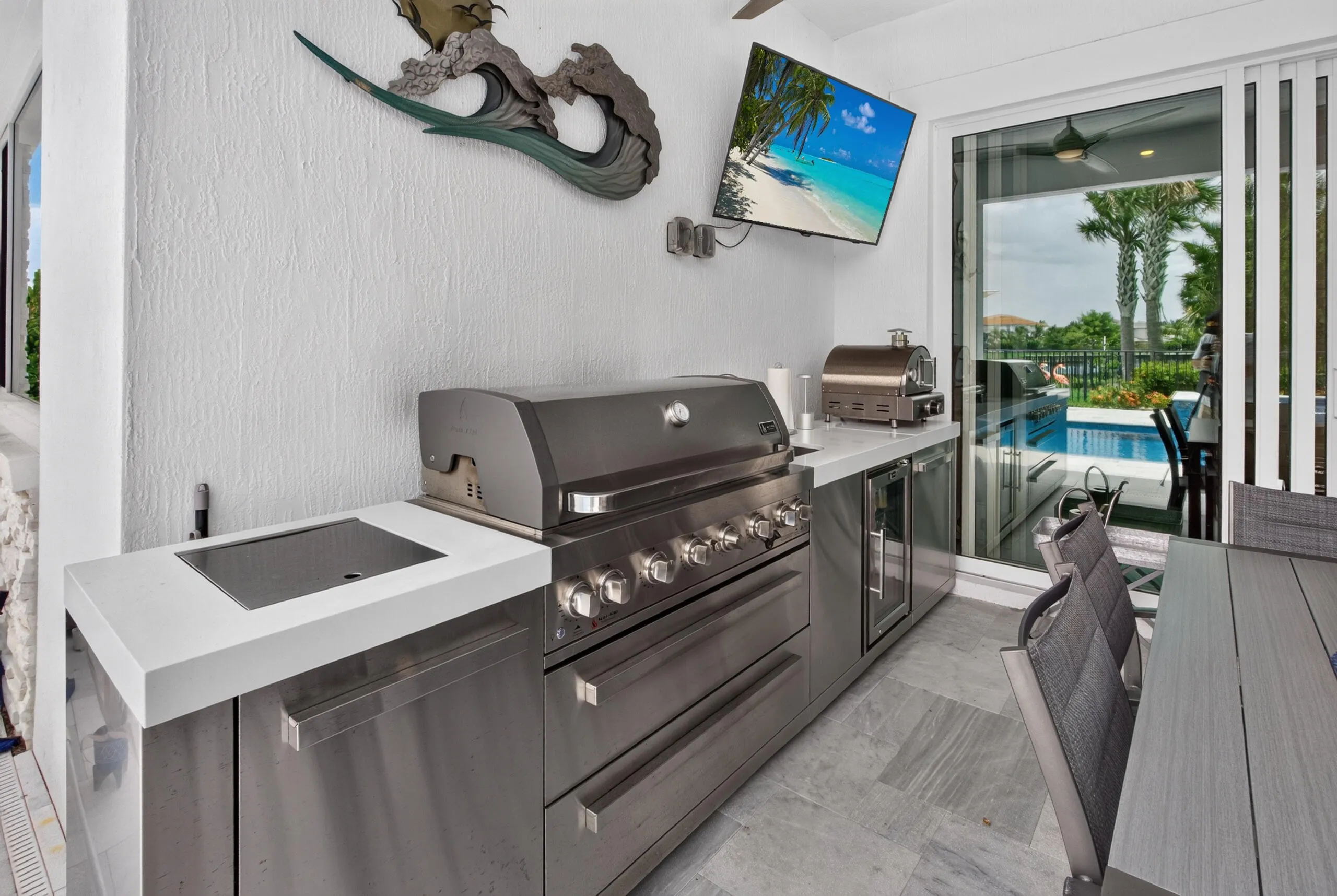 Outdoor Kitchen with sink and refrigerator