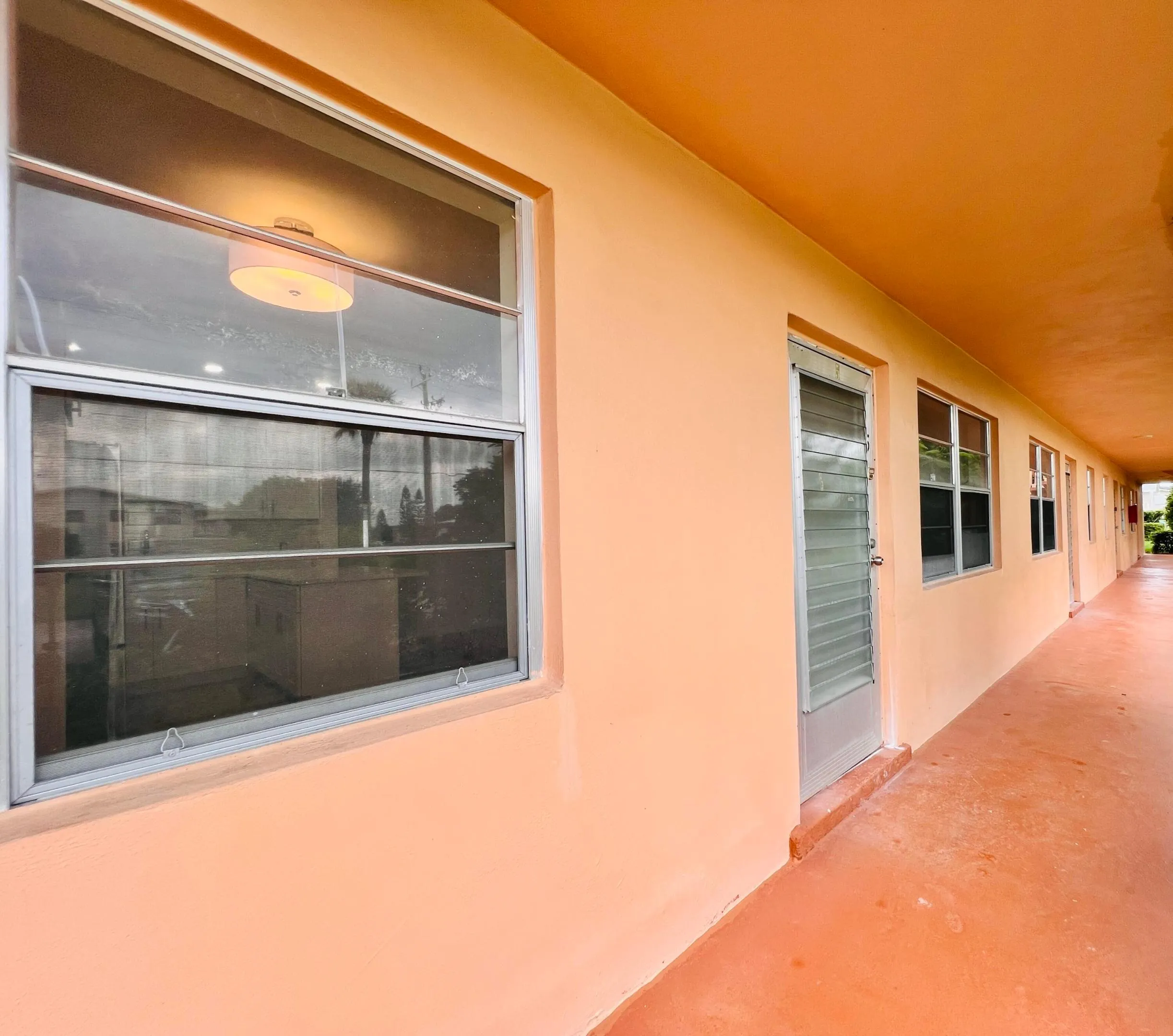 First Floor Beautifully Updated 2/1.5! New Kitchen, Baths, Flooring, Interior Doors, Water Heater, Electrical Panel