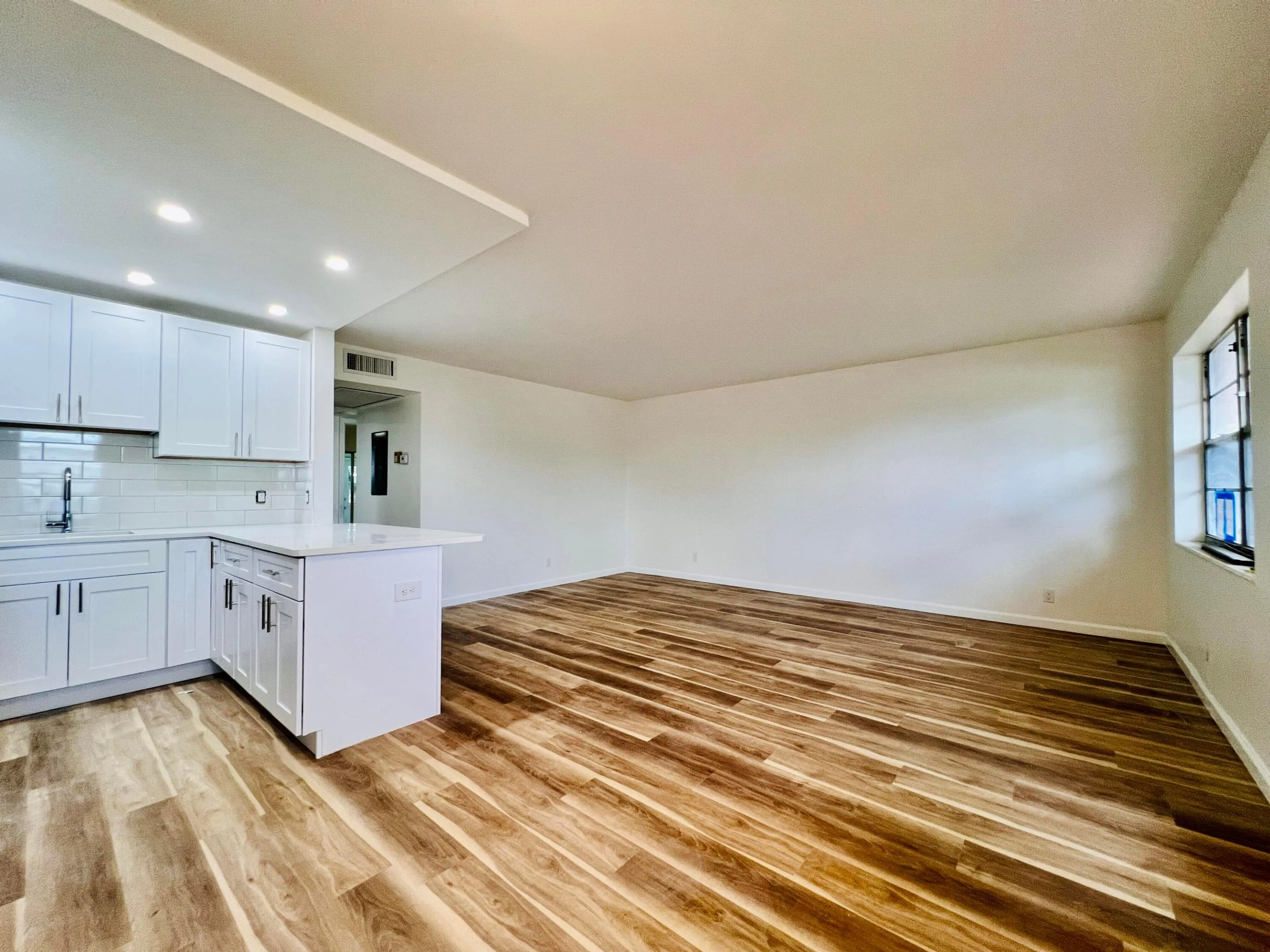 Open Concept Living Area! New Flooring! Popcorn Removed! New Kitchen! New Baths!