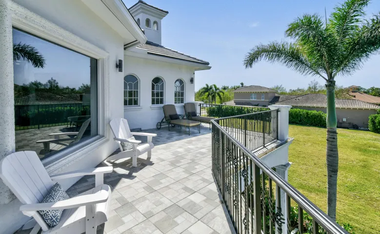 Balcony showing adirondack chairs and lo