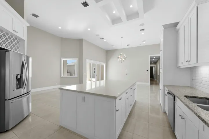 Kitchen and secondary living room