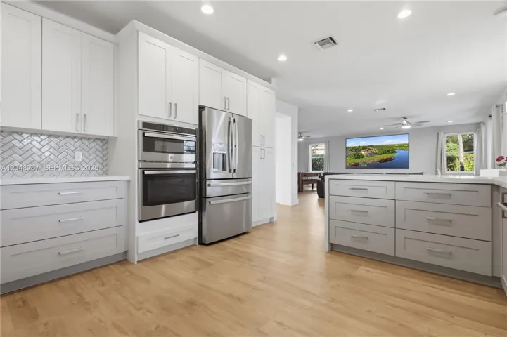Wall Oven and Wall Microwave with GE Profile Refrigerator
