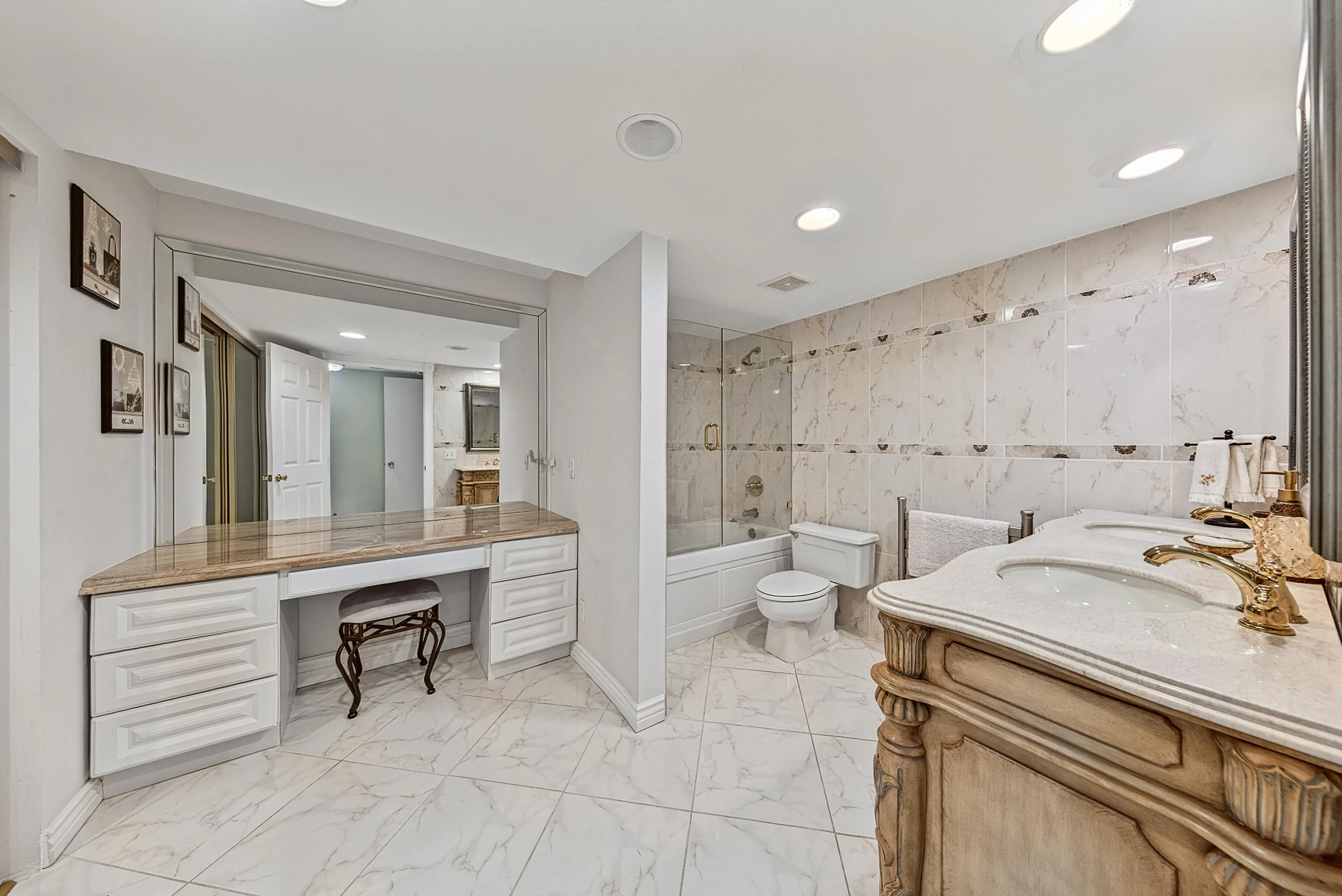 primary bathroom, vanity area, tub and shower combo