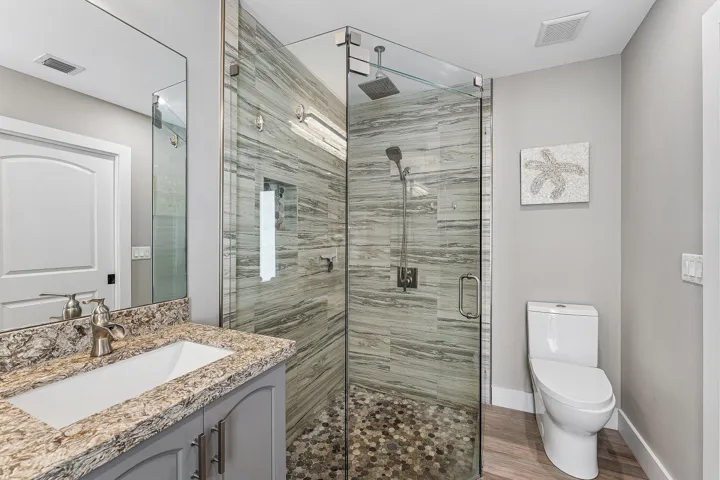 Glass Enclosed Shower with Ceiling Mounted Rain Shower