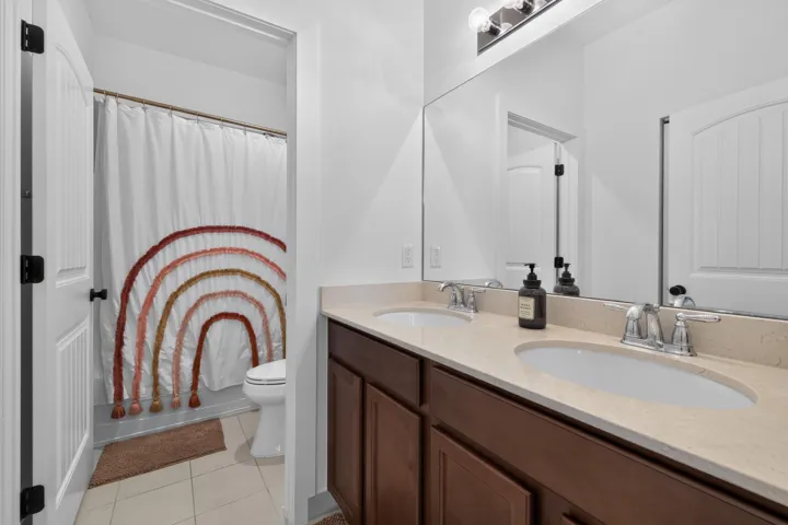 Full bath 3 located off the hall between bedrooms 4 & 5