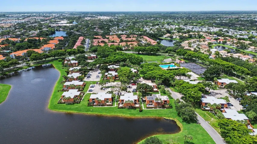 Aerial perspective showcasing a residential community with abundant green spaces