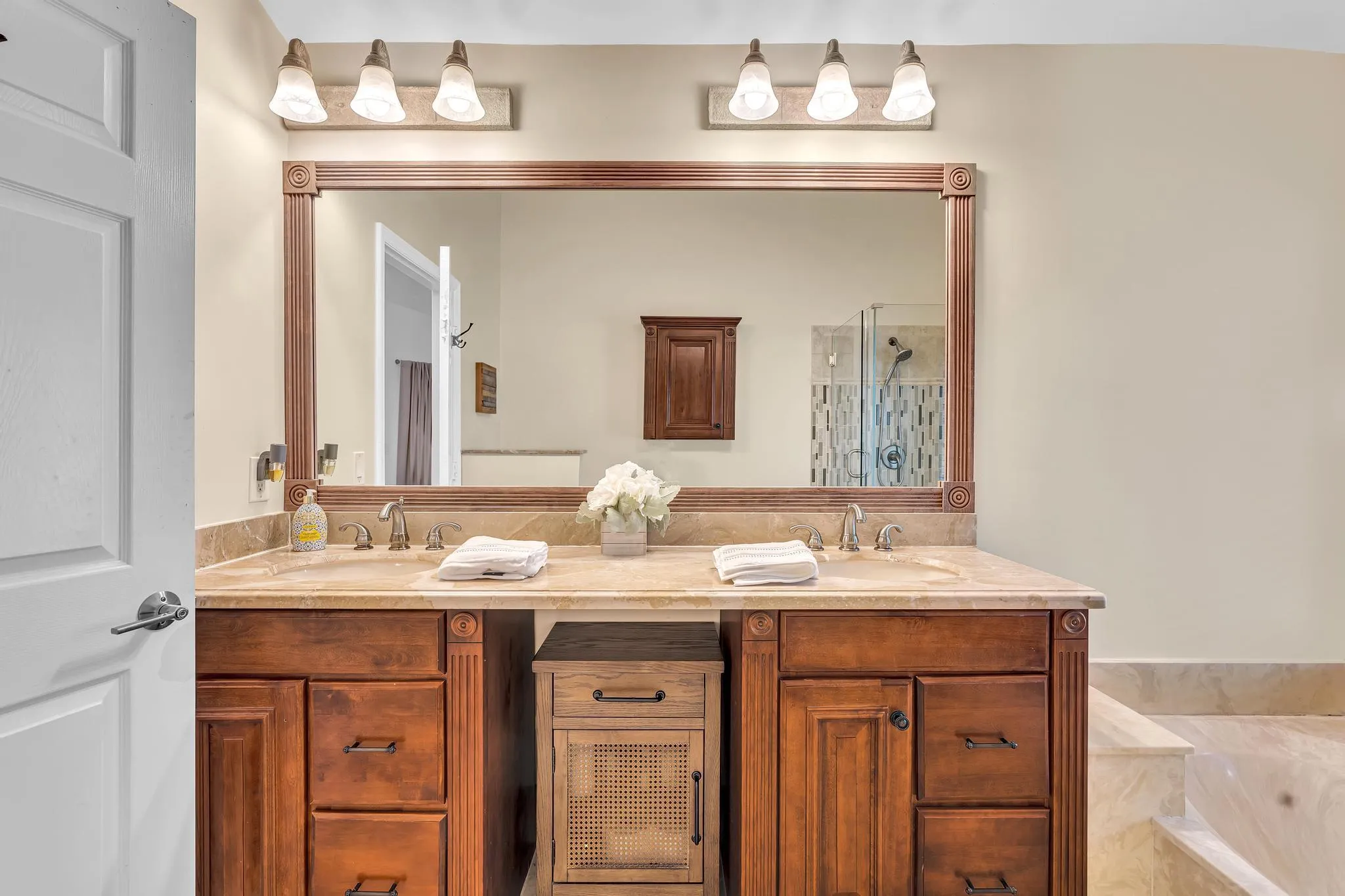 Updated Primary Bathroom with shower and tub double vanity